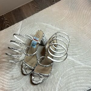 NWT Sugar leopard sandals that wraps around the leg